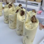 picture of Apple snickers salad served in small clear cups.