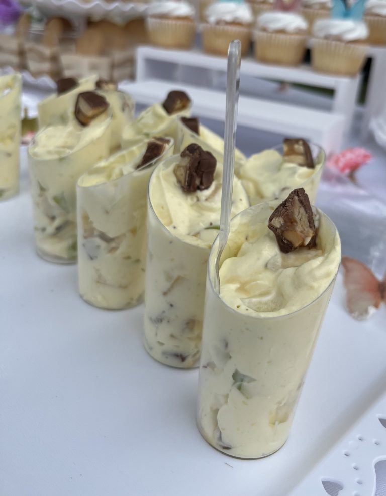picture of Apple snickers salad served in small clear cups.